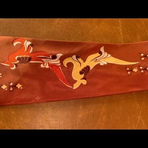 Late 1940’s rust with yellow/orange flourish tie